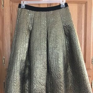 Full gold mid length skirt.